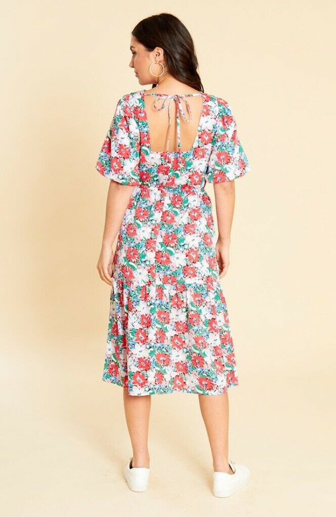Red multi floral printed midi dress with short puff sleeves, drop hem and low back with tie detail